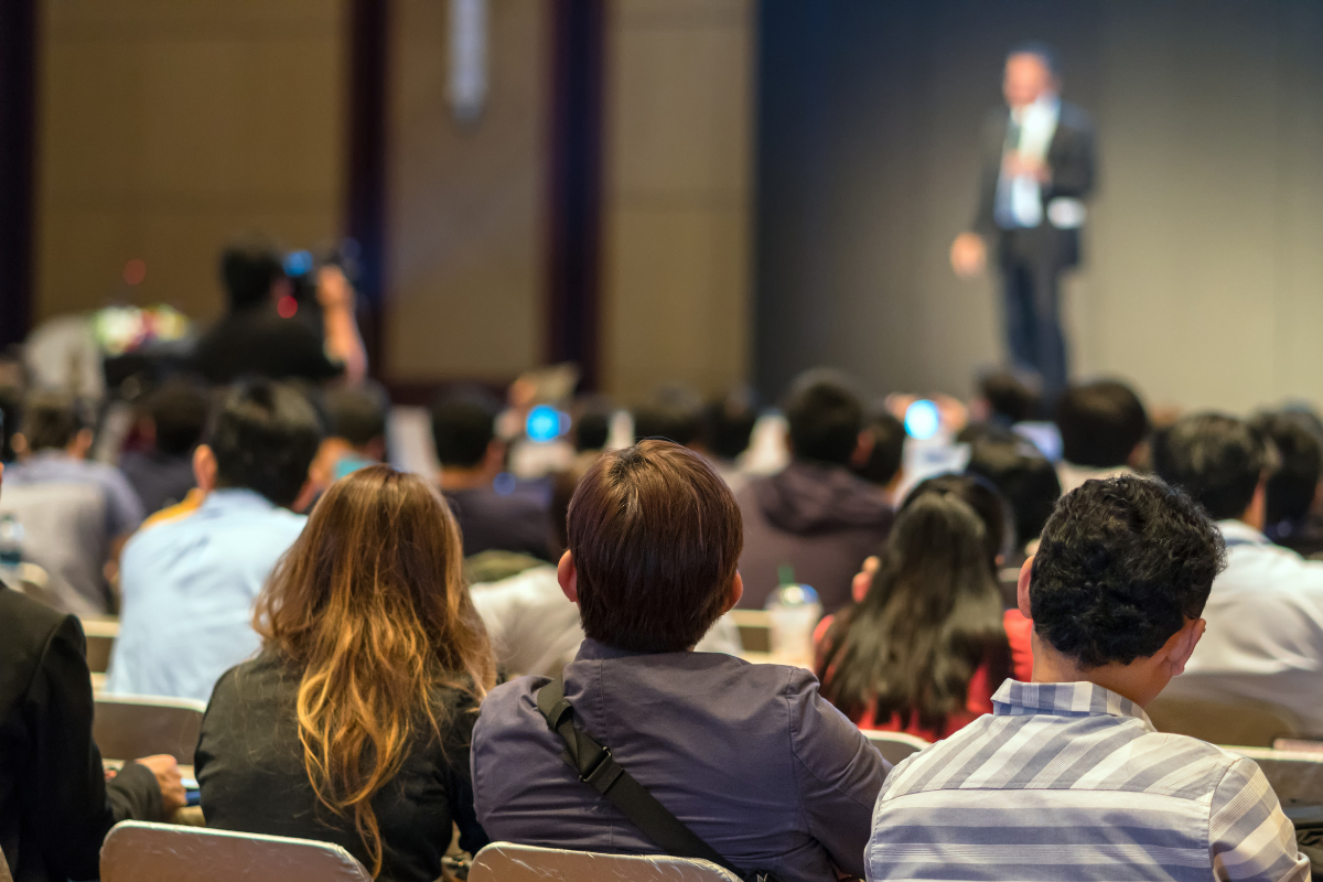 Audience attending a health and wellness seminar during a KnowvaLife educational event