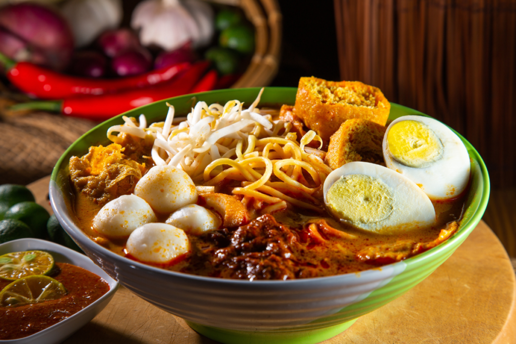 Healthy Mee Rebus prepared with lean protein, vegetables, boiled eggs and wholegrain noodles.