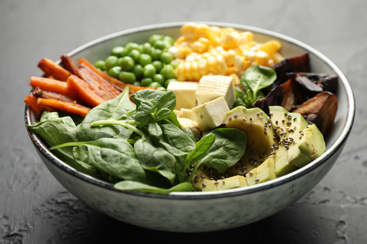 Colourful healthy recipe bowl with vegetables and lean protein