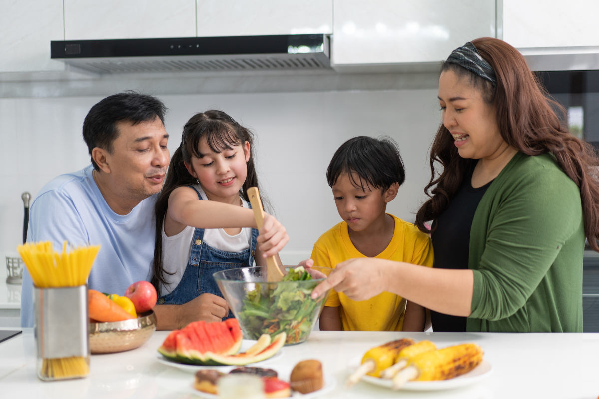 Family preparing healthy food together