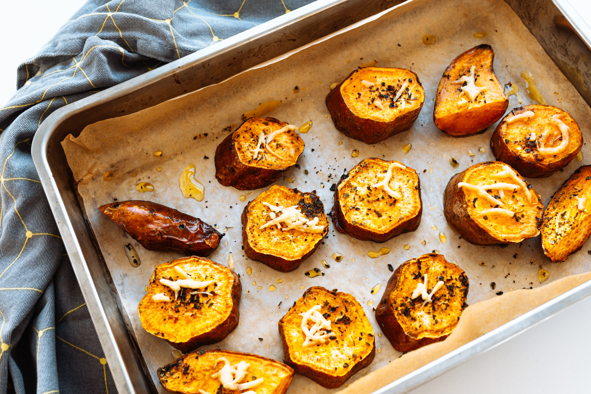Oven-baked sweet potato bites seasoned with herbs and spices