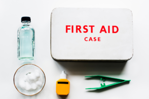 First aid kit with basic emergency supplies for use at home