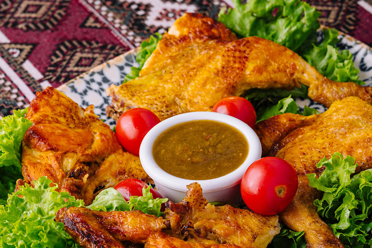 Grilled Turmeric Chicken with fresh vegetables and lime