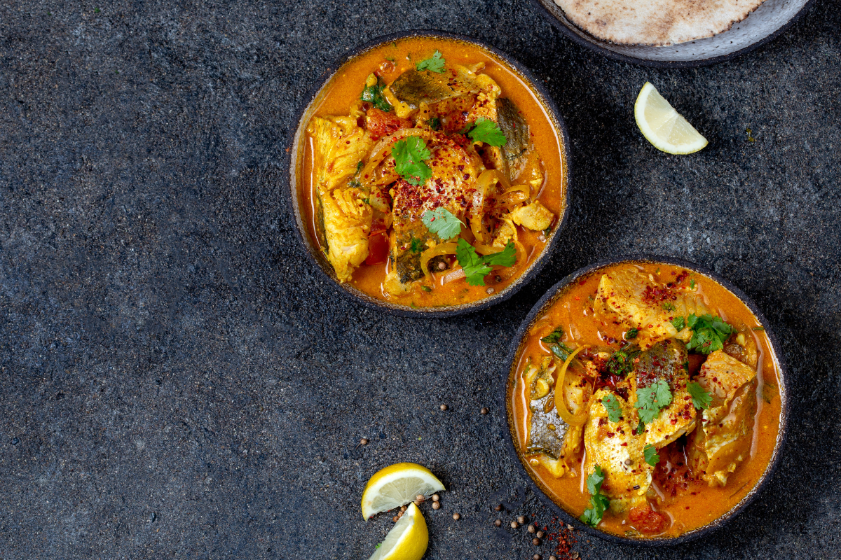 Healthy Fish Curry with tender fish, tomatoes and vegetables