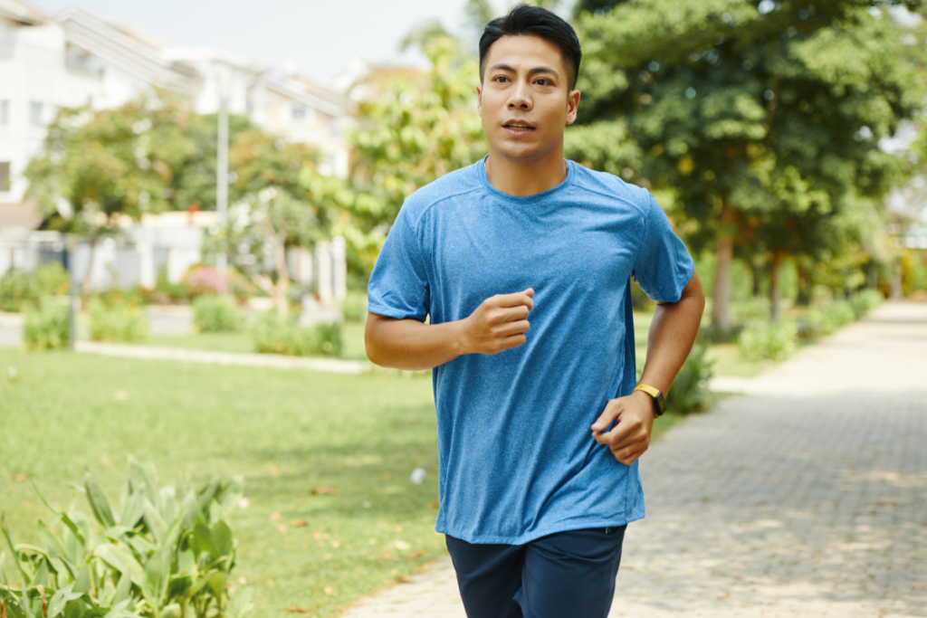 Man jogging outdoors as part of a regular exercise routine